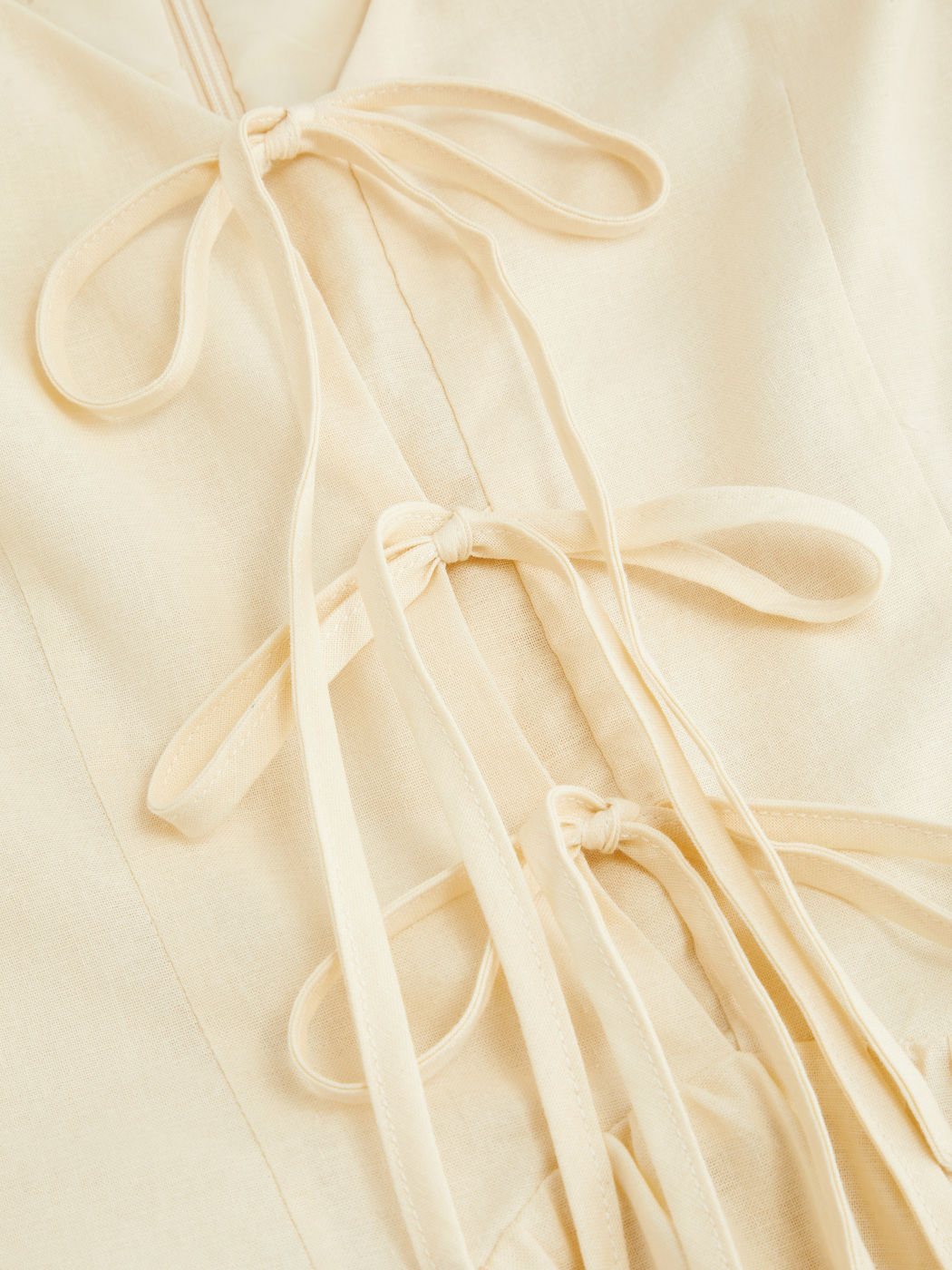 Linen-blend V-neck Tie Front Bow Ruffle Mini Dress